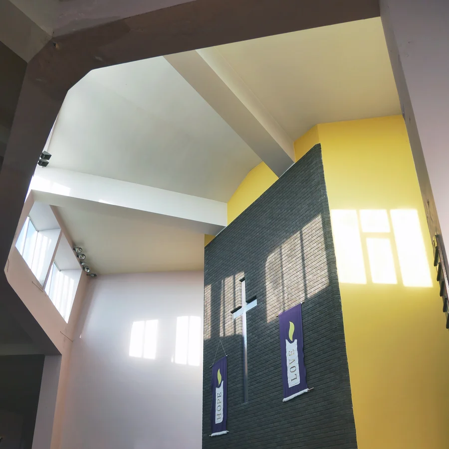Church ceiling above the pulpit with a cross