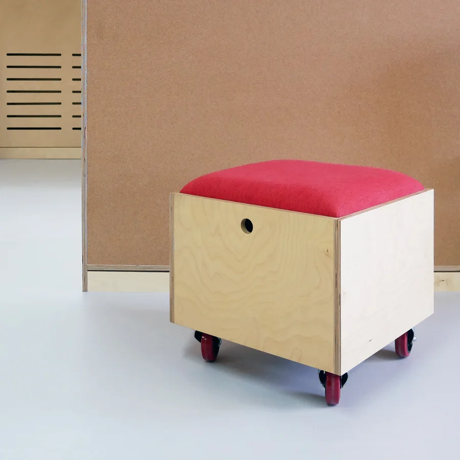 Cubic wooden office stool on wheels